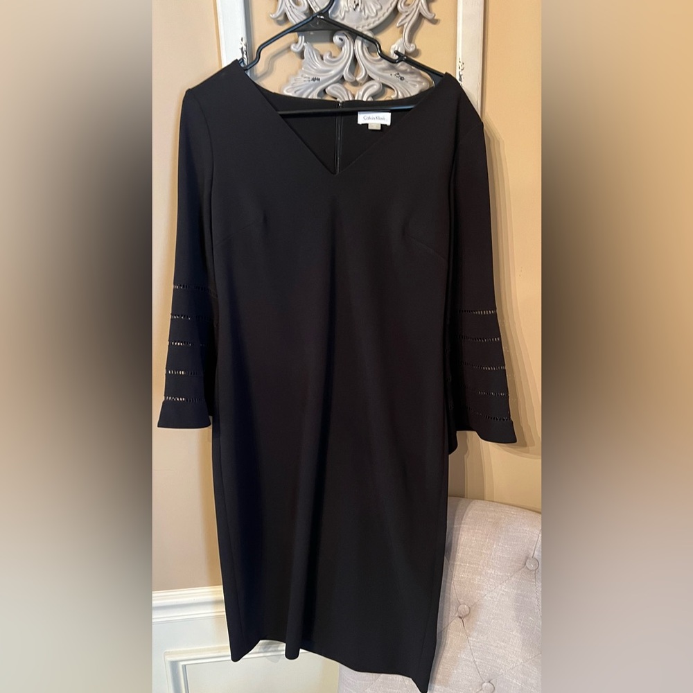 Calvin Klein classic black dress with bell sleeve detail